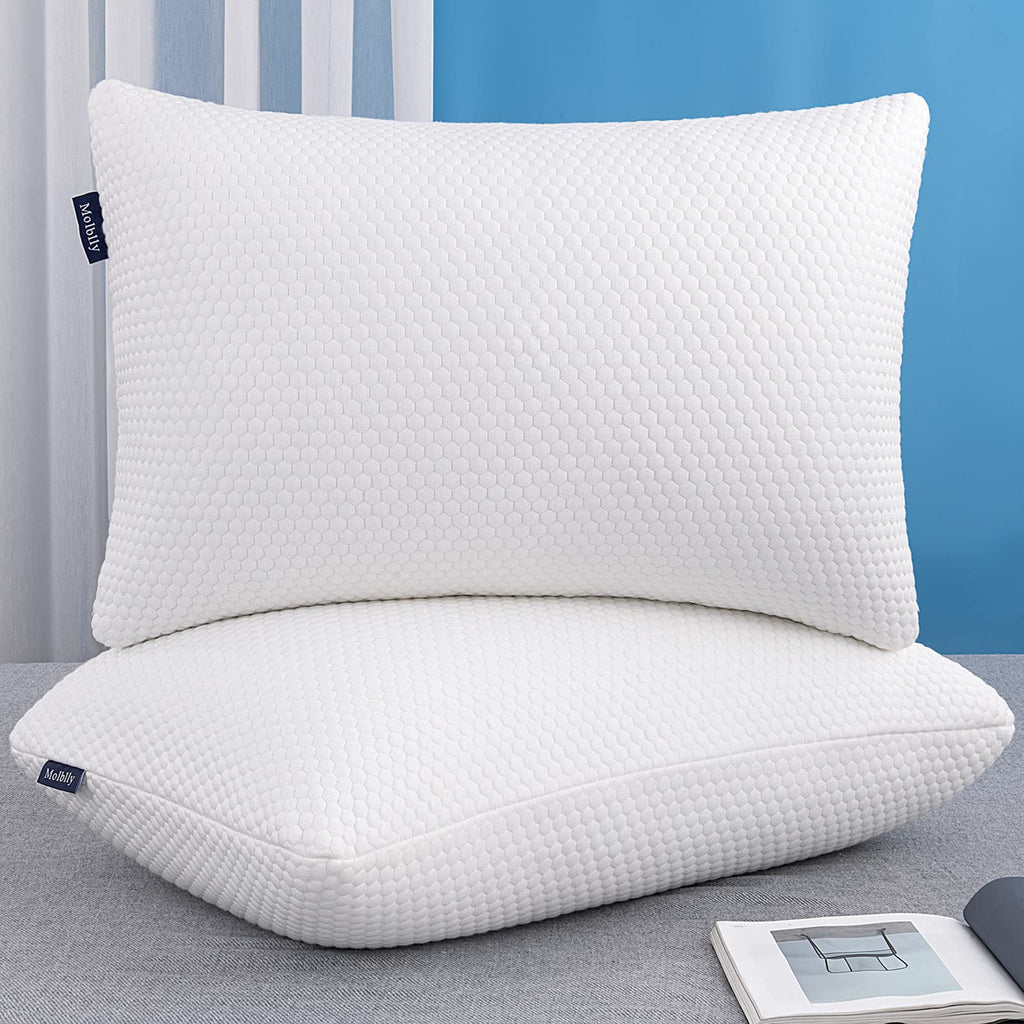Woman enjoying a restful sleep on the fully adjustable MOLBLLY PILLOW